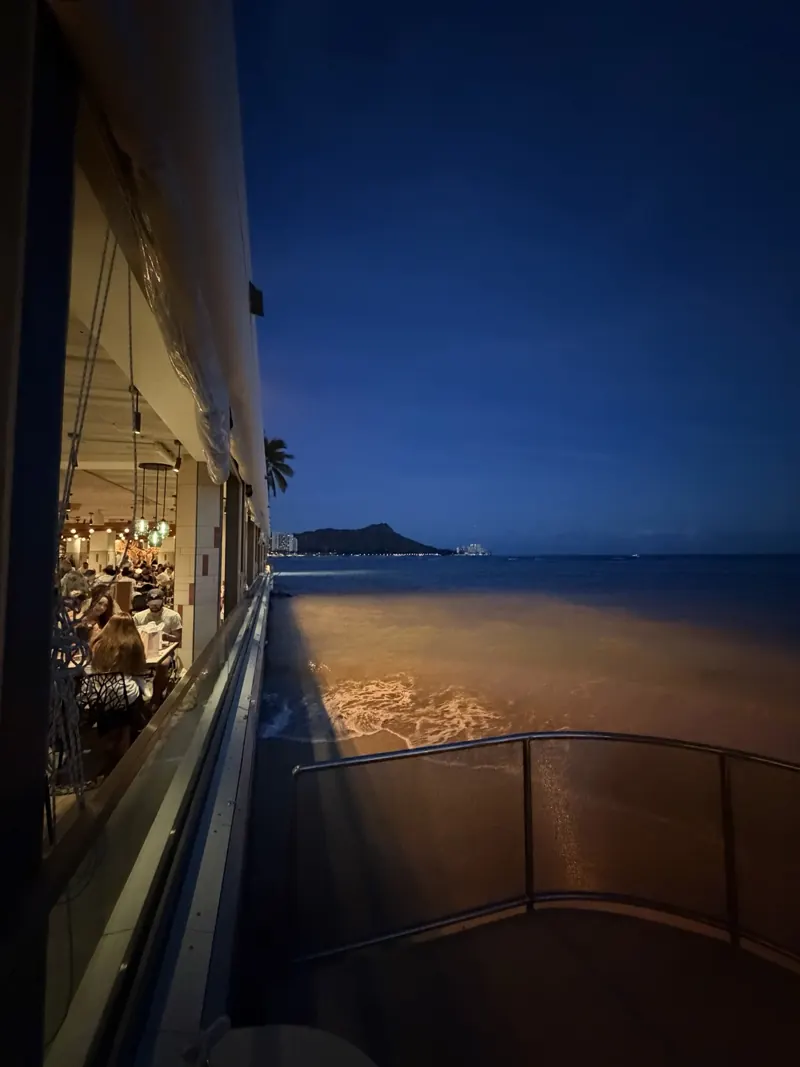 Night view over Waikiki from a restaurant